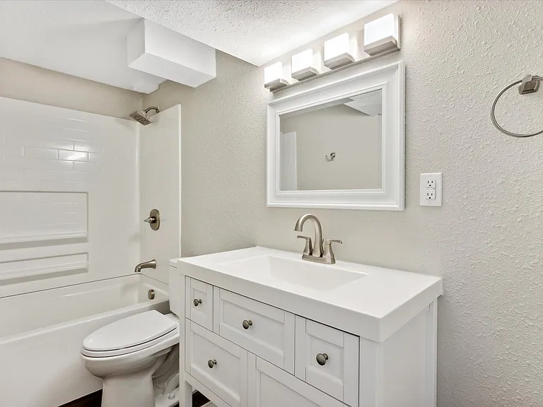 Basement Bath Has 2 Access Points...From One of the Bedrooms & Also From the Living Area