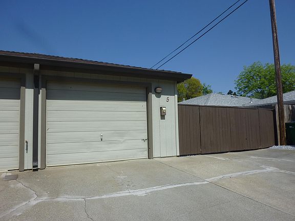 Garage and gate to courtyard