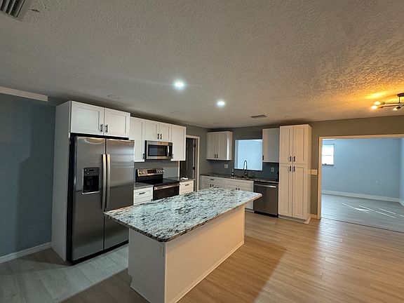 Kitchen opens to family room