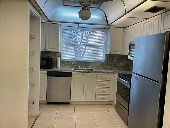 4th image of 9481 Sunrise Lakes Boulevard #102