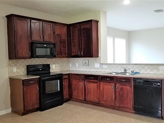 5th image of 7410 Jacobs Well Dr