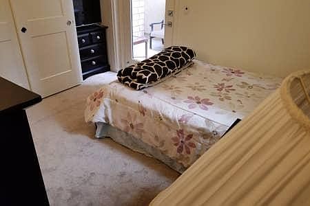 Downstairs bedroom. The full size bed against the wall sleeps a couple comfortably. A mattress underneath the bed can sleep another person.