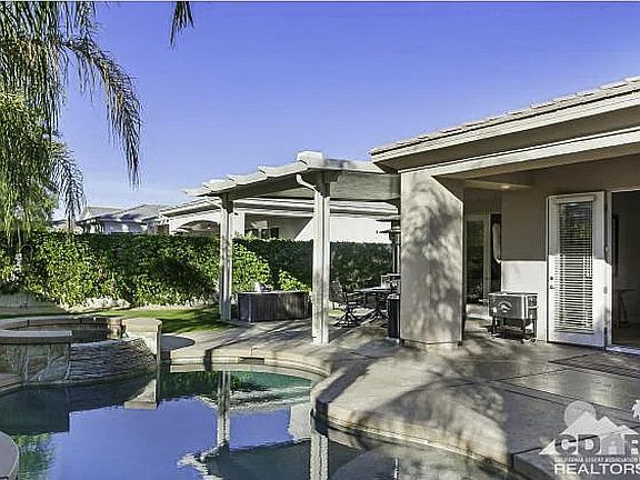 Backyard with pool and deck