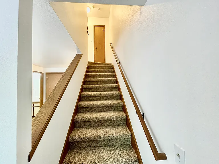 Linen closet at top of stairs