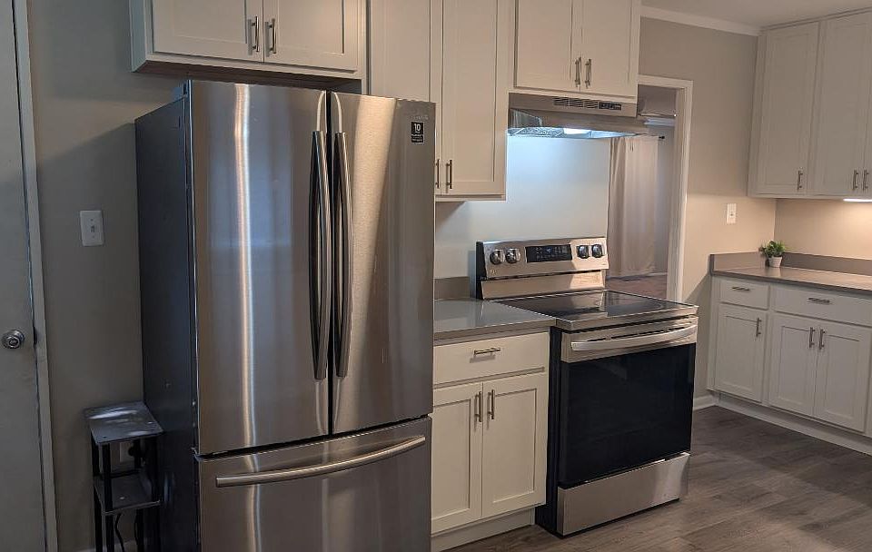 Brand new kitchen cabinets, quarts countertops and luxury vinyl plank floor
