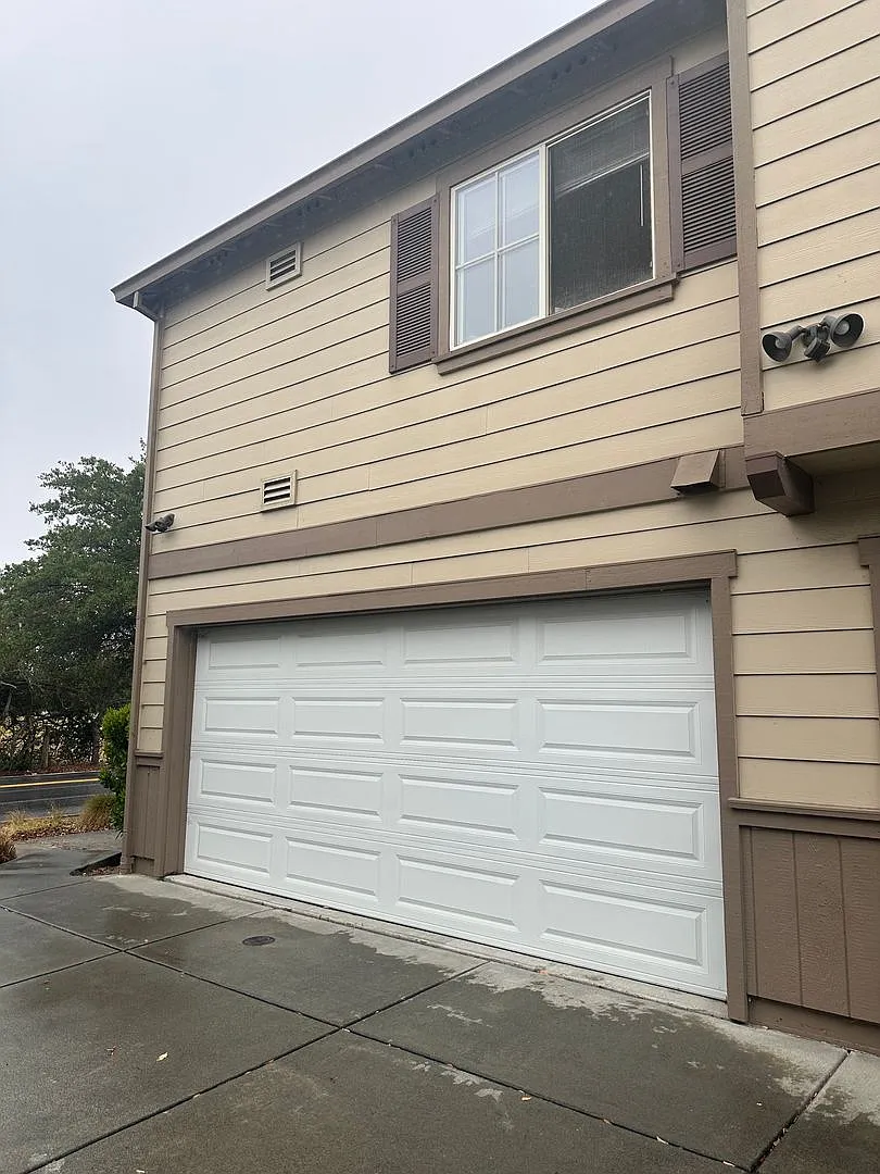 Three Bedroom Townhouse Style Apartment with Two Car Garage! — Photo 1