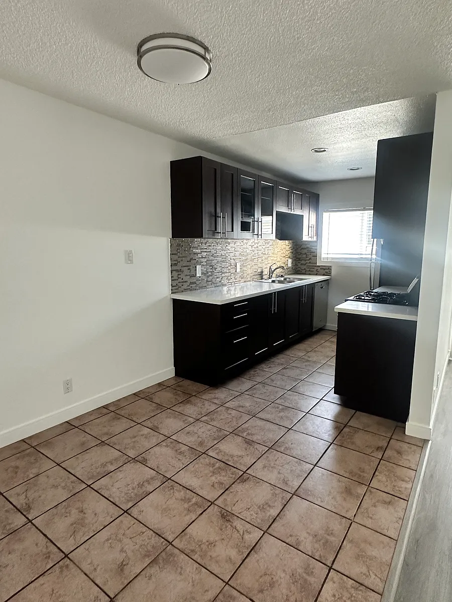 Building Photo - 8843 Alcott St #9