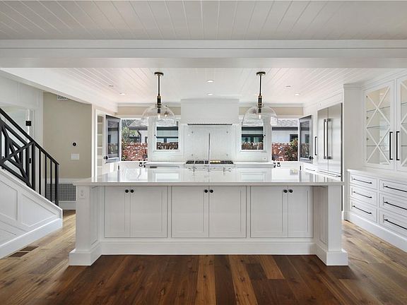 Large Kitchen Island that open ups to living room.