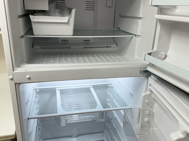 New open refrigerator with icemaker.