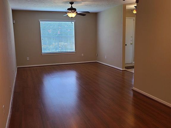 Full view of Living Room from Dining Room,