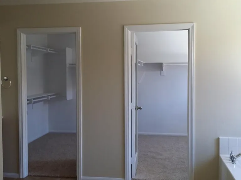 Dual master bedroom closet.