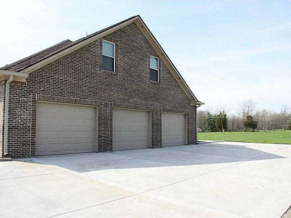 Garage. Over sized 3 car garage, yes it will fit the crew cab, 6 ft bed pick up!
