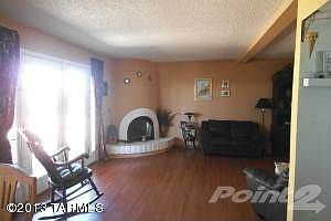 Family room with beehive fireplace