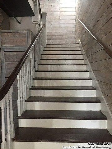 Stairs from entry to second floor