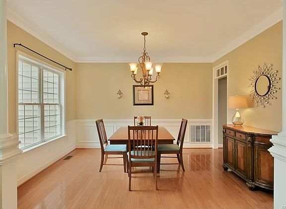 Dining room with Crown molding, chair rail, picture frame molding
