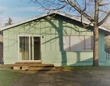 Outside deck area in front of sliding glass doors ready for your patio furniture. Off street parking for two cars