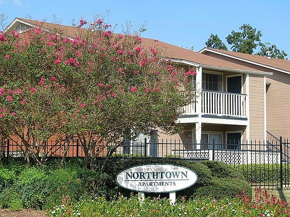Enjoy lush greenery and a serene atmosphere at Northtown Apartments.