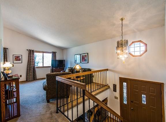 Top of the entry steps, view of Living Room.