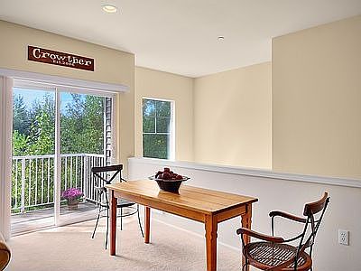 Eating nook with sliding doors to deck.