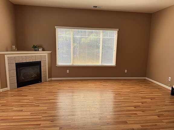 Large living room with gas fireplace.