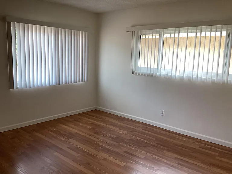 Bedroom with mountain views and wall-to-wall closets
