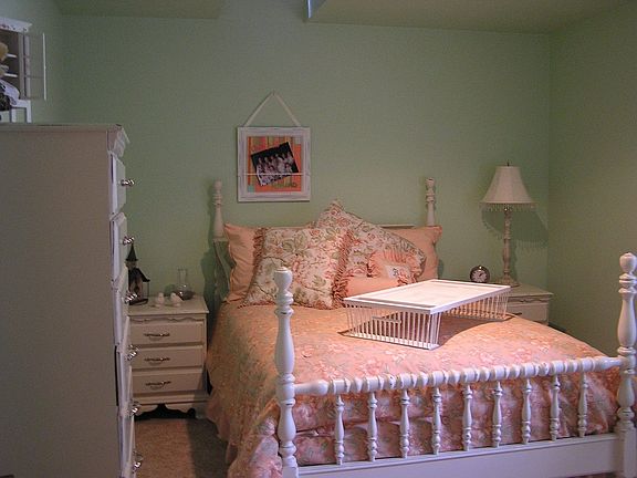 One of the 4 bedrooms. Notice the skylight!