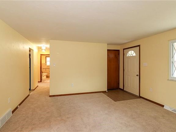 Living room, looking down hallway.