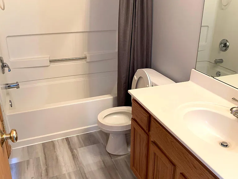 Full bathroom with new flooring