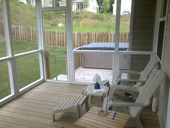 Screened in porch and extended hot tub deck