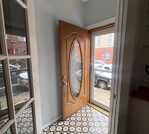 Entry/Mud room with beautiful floor mosaic detail