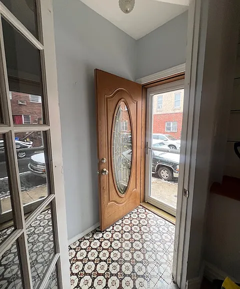 Entry/Mud room with beautiful floor mosaic detail