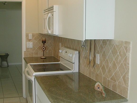 Ganite and tumbled marble Kitchen