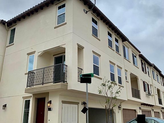 3 floor Corner Unit with 2-car garage with 2 car drive way.