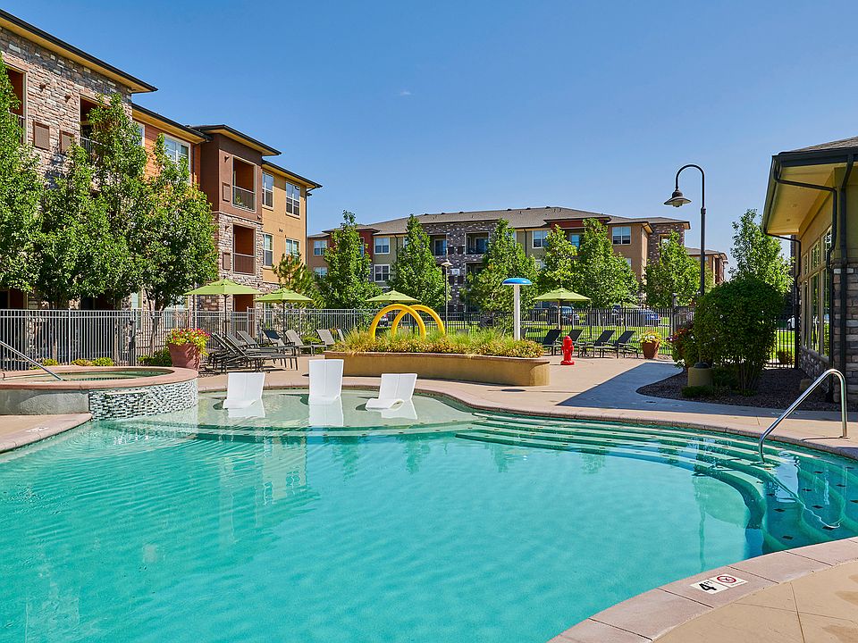 Resort-inspired pool with tanning shelf