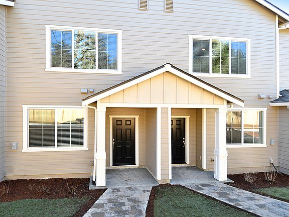 Welcome guests with a covered front entry to the Blackberry.