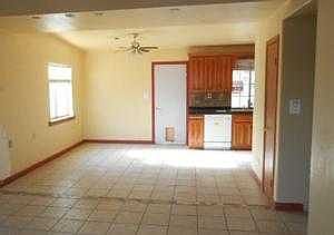 Dining and kitchen areas, door to covered patio