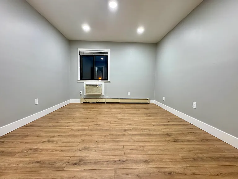 The 2nd Bedroom includes brand new flooring and new ceiling lights.