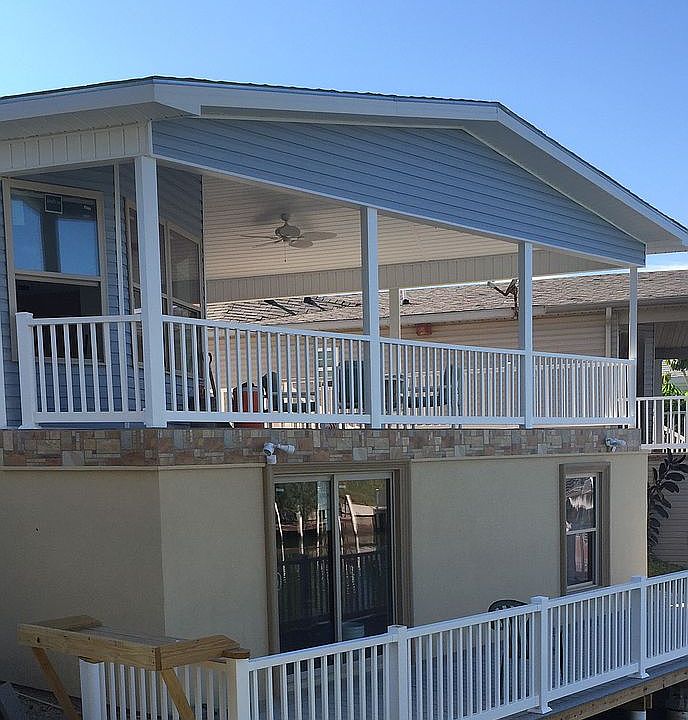 View of back porch and dock