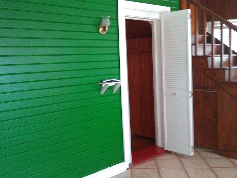 Living Room towards Bedroom 2/Den.