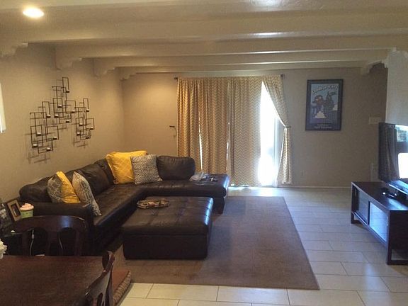 Spacious living room with sliding door to front patio - Dutch door and second sliding door provide excellent air flow