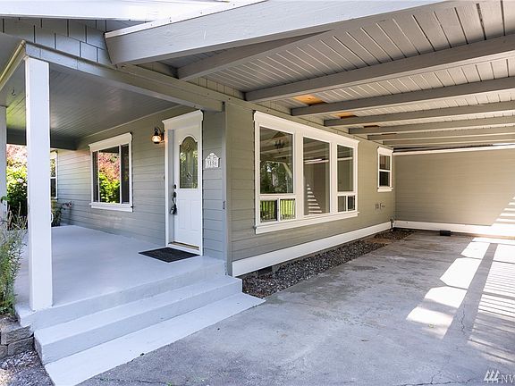 Front entrance and covered porch and patio