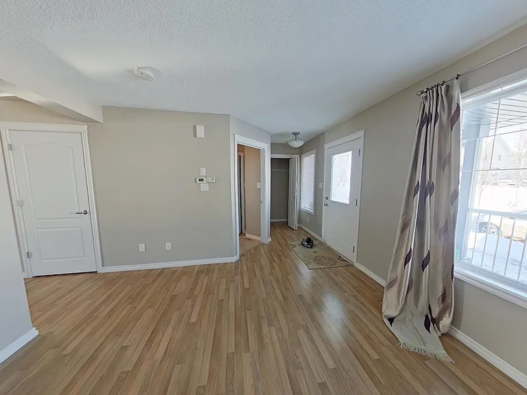 7665 Schmid Cres NW — Photo 2