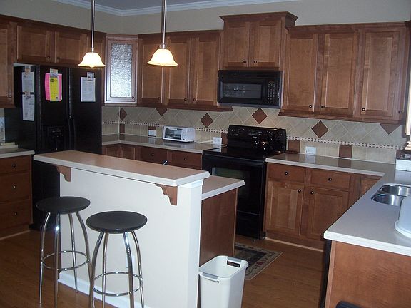 Kitchen with Hardwood floors