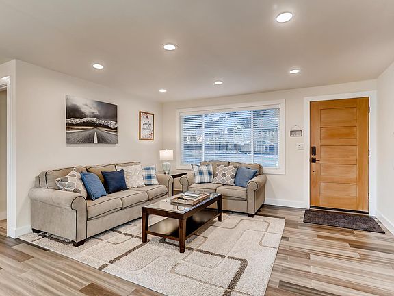 Living Room with a nice 55" Smart TV with Apps to watch your favorite shows