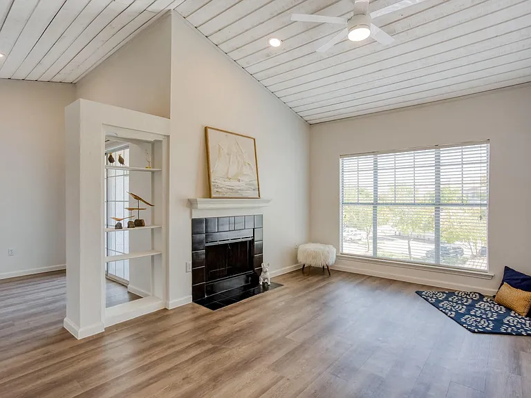 Unique living room layout with large windows
