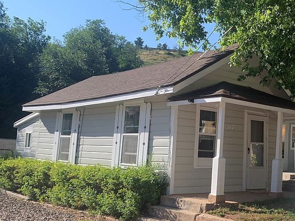 Front Deck has beautiful view of Manitou Hills! - Gated entry to back yard area