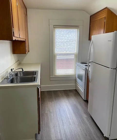 Galley kitchen with newer appliances