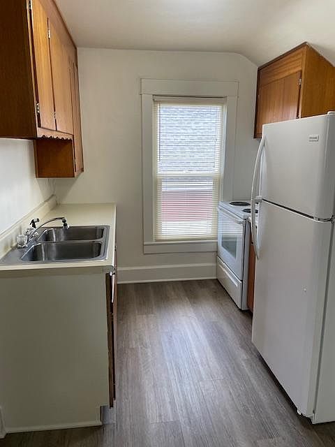 Galley kitchen with newer appliances