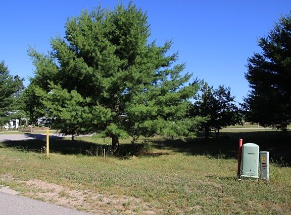 S edge of lot 57 along alley