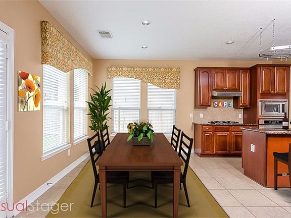Notice the open space and large breakfast room(virtual staging).